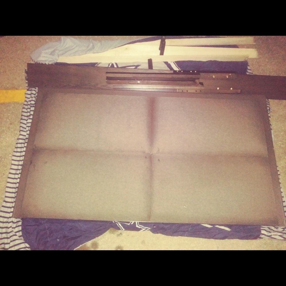 Brown wooden twin size bed frame